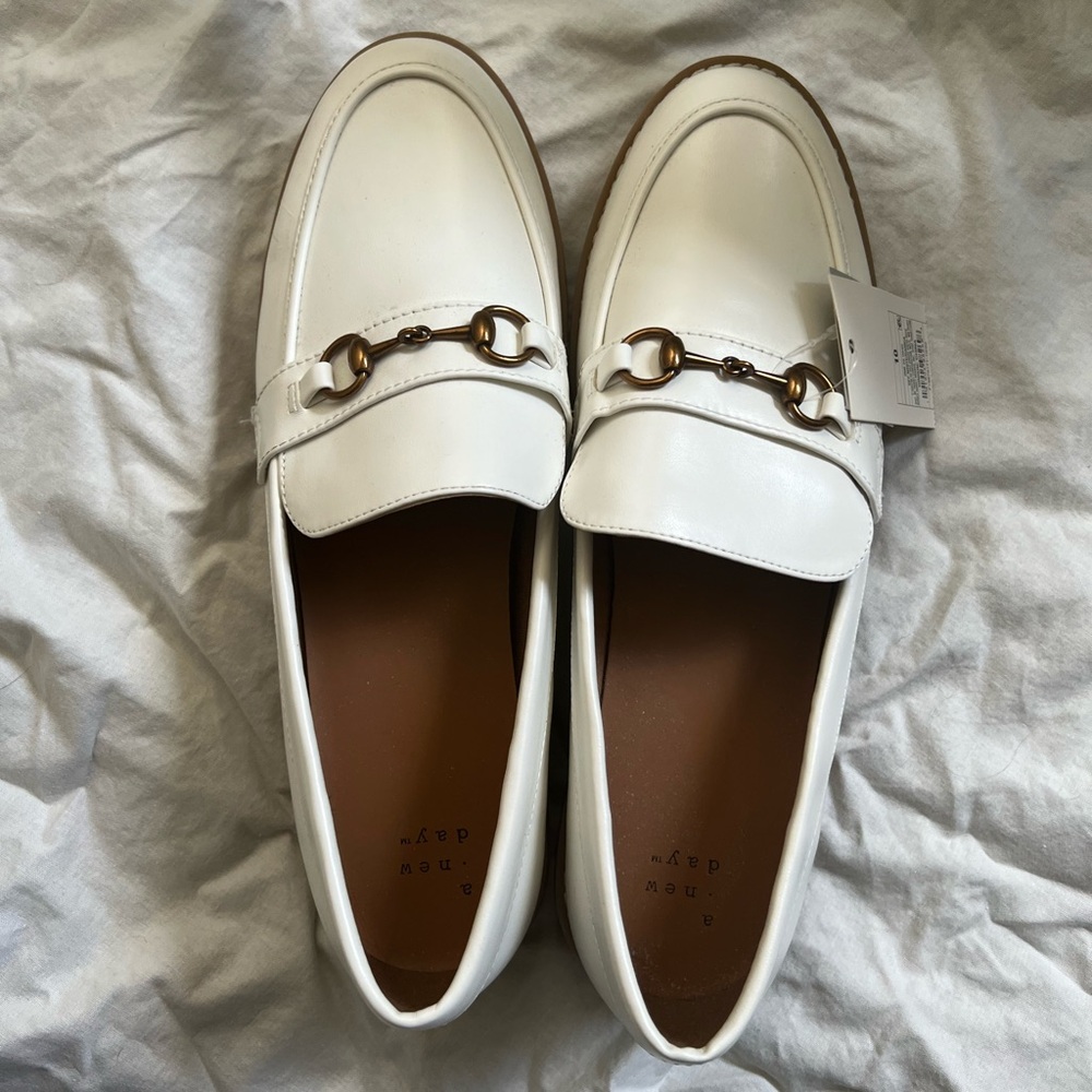 White women’s loafers with small heel and memory foam soles